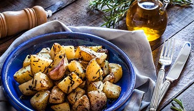 A dish of herb roasted potatoes.