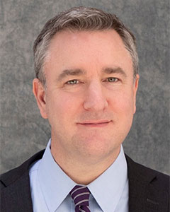 Headshot of Craig Umscheid