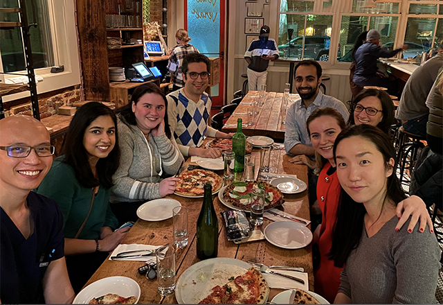 Fellows enjoying dinner together