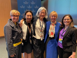 From left to right: Drs. Sabra Klein, Tina Zhang, Wen Shen, JoAnn Pinkerton, and Wendy Bennett smile for a photo at the 17th Annual Johns Hopkins Center for Women's Health, Sex, and Gender Research Spring Symposium