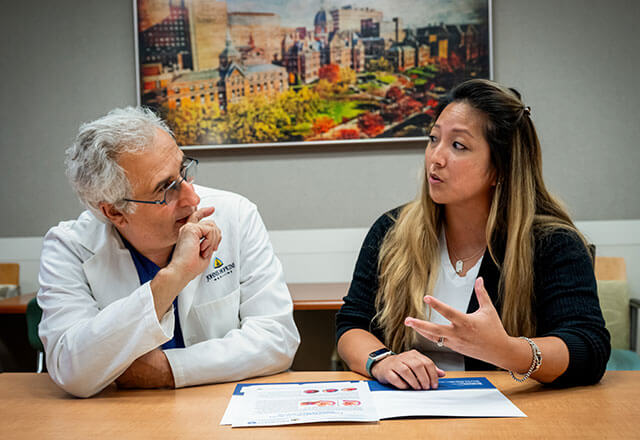 Doctor Baschat consults with patient