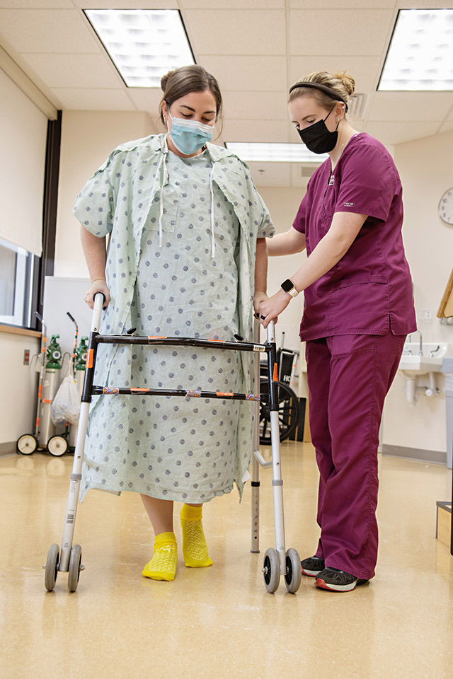 nurse with rehab patient