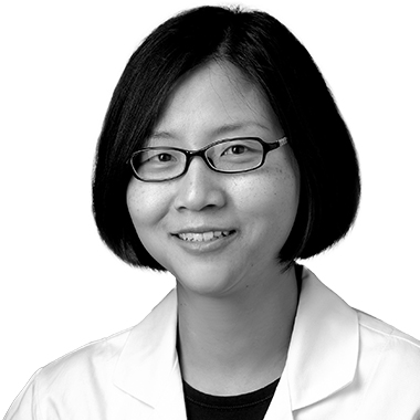 Jee Bang in her white coat.