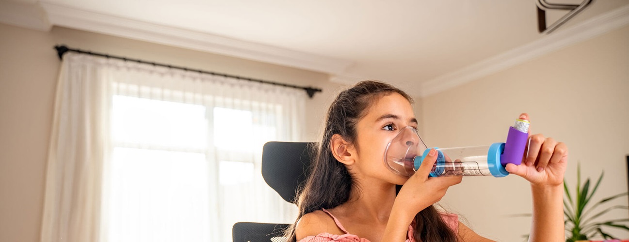 a child uses an inhaler and nebulizer for asthma