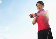 woman checking her heart rate