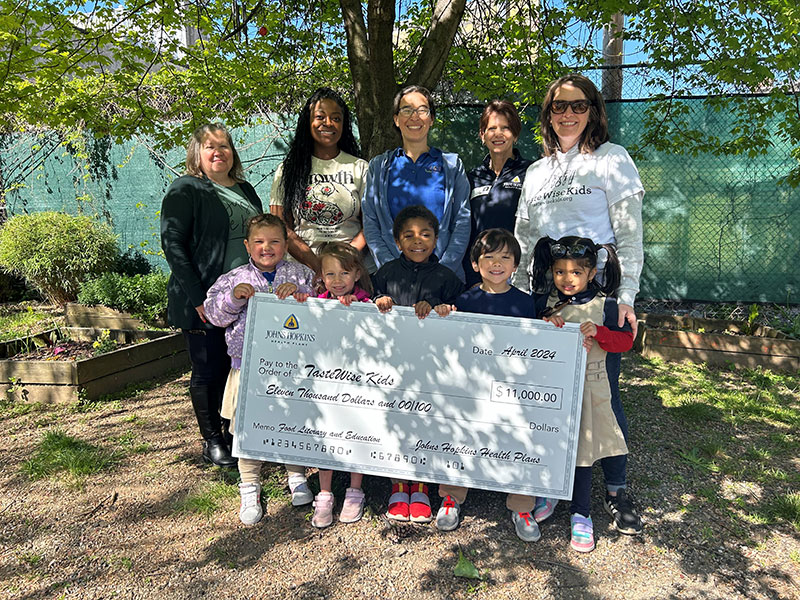 Johns Hopkins Health Plans’ Trish Slutzky, Director of Client Relations, Employer Health Programs, was at Federal Hill Preparatory School to present the check to Salina Duncan, Executive Director of TasteWise Kids, and Program and Partnerships Manager, Julie Eugenio.