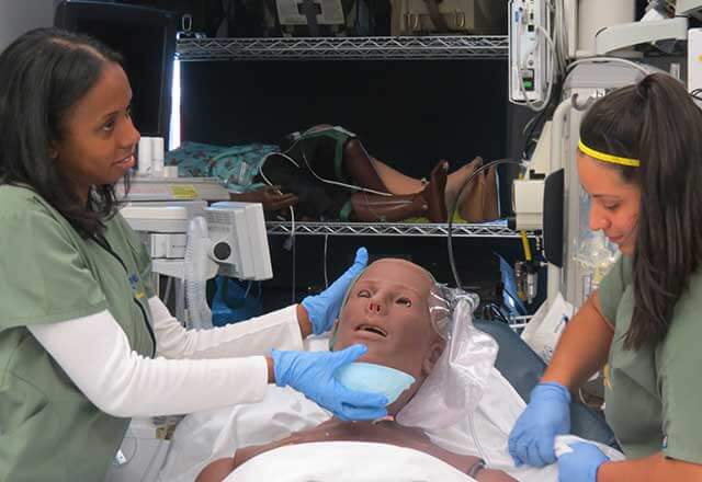 nurses training with simulated body