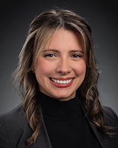 Headshot of Timea Tozser