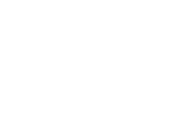 White icon of a speech bubble with text inside, a star icon is at the bottom right of the speech bubble.