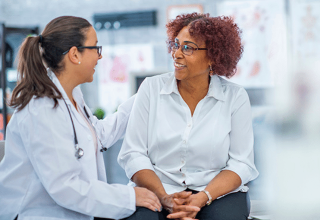 woman talking to her doctor