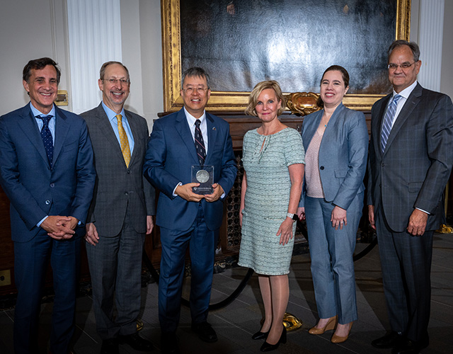 Among those present for the event were (from left) Ron Daniels, president of Johns Hopkins University; Dr. Jonathan Lewin, former chair of the Department of Radiology; Dr. John Eng, inaugural Jones Professorship recipient; Dr. Karen Horton, chair of the Department of Radiology; Dr. Marlis Gonzalez-Fernandez, interim director of the Department of Physical Medicine and Rehabilitation for Johns Hopkins School of Medicine; and Dr. Landon King, Executive Vice Dean of Johns Hopkins School of Medicine. 