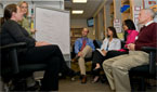 Harriet Lane’s mental health team of, left to right, Justine Larson, Emily Frosch, Barry Solomon, Dana Yates, and Jim Tanner, discuss a case with resident Lisa Kantz, third from right.  