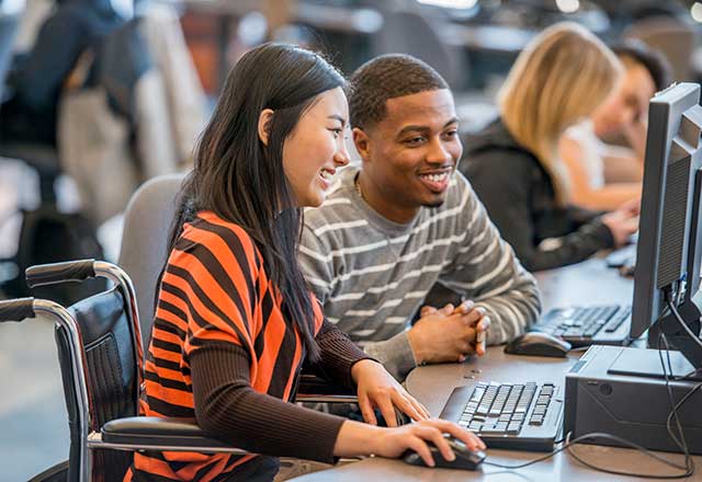 Students looking at a computer screen