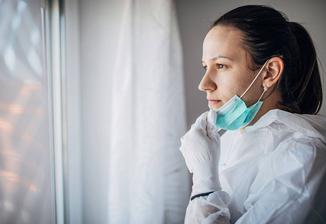 Nurse wearing personal protective equipment