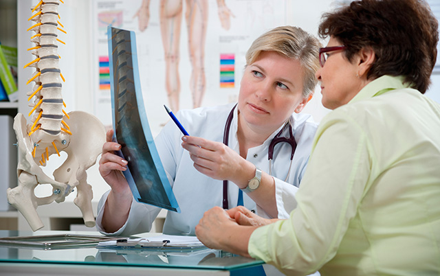 Doctor reviewing images with patient