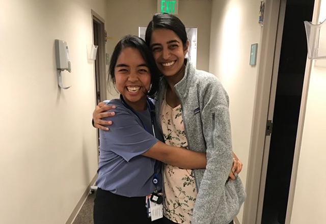 two students smiling